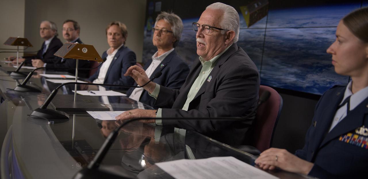 Phil Morton, NASA GRACE-FO project manager at JPL, second from right, discusses the Gravity Recovery and Climate Experiment Follow-On (GRACE-FO) mission during a prelaunch media briefing, Monday, May 21, 2018, at Vandenberg Air Force Base in California. The twin GRACE-FO spacecraft will measure changes in how mass is redistributed within and among Earth's atmosphere, oceans, land and ice sheets, as well as within Earth itself. Photo Credit: (NASA/Bill Ingalls)