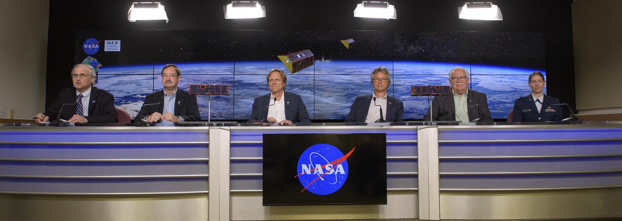 NASA Headquarters Public Affairs Officer Steve Cole, left, moderates the Gravity Recovery and Climate Experiment Follow-On (GRACE-FO) mission prelaunch media briefing with David Jarrett, GRACE-FO program executive in the Earth Science Division at NASA Headquarters; Frank Webb, GRACE-FO project scientist at JPL; Frank Flechtner, GRACE-FO project manager for the German Research Centre for Geosciences (GFZ) in Potsdam, Germany; Phil Morton, NASA GRACE-FO project manager at JPL; and Capt. Jennifer Haden, weather officer, 30th Space Wing, Vandenberg Air Force Base, right,  Monday, May 21, 2018, at Vandenberg Air Force Base in California. The twin GRACE-FO spacecraft will measure changes in how mass is redistributed within and among Earth's atmosphere, oceans, land and ice sheets, as well as within Earth itself. Photo Credit: (NASA/Bill Ingalls)
