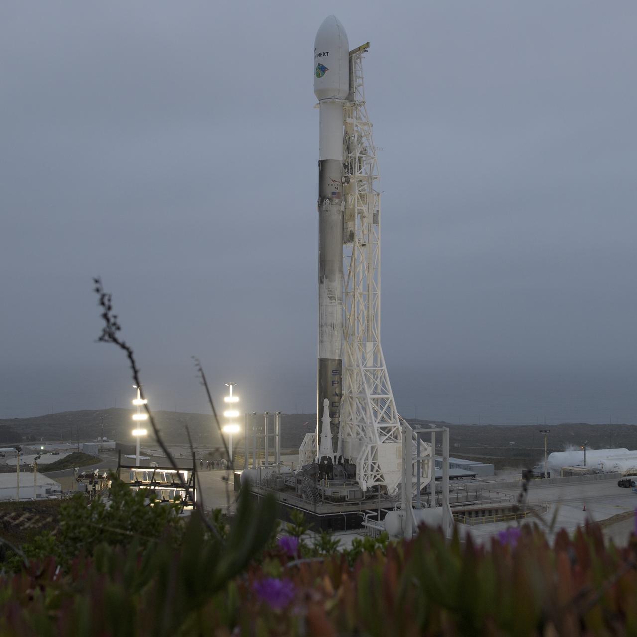 The SpaceX Falcon 9 rocket is seen with the NASA/German Research Centre for Geosciences GRACE Follow-On spacecraft onboard, Monday, May 21, 2018, at Space Launch Complex 4E at Vandenberg Air Force Base in California. The mission will measure changes in how mass is redistributed within and among Earth's atmosphere, oceans, land and ice sheets, as well as within Earth itself. GRACE-FO is sharing its ride to orbit with five Iridium NEXT communications satellites as part of a commercial rideshare agreement. Photo Credit: (NASA/Bill Ingalls)