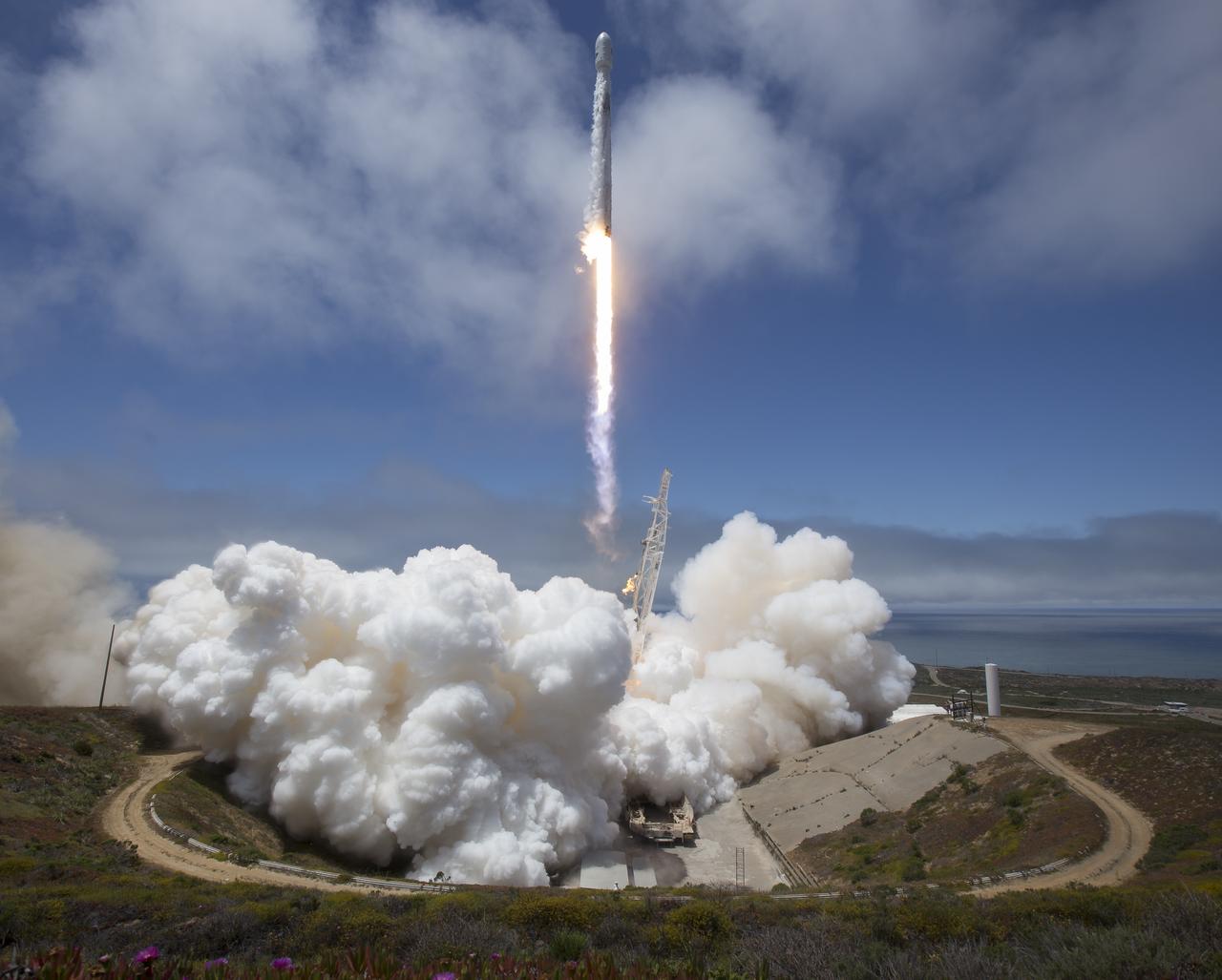 The NASA/German Research Centre for Geosciences GRACE Follow-On spacecraft launch onboard a SpaceX Falcon 9 rocket, Tuesday, May 22, 2018, from Space Launch Complex 4E at Vandenberg Air Force Base in California. The mission will measure changes in how mass is redistributed within and among Earth's atmosphere, oceans, land and ice sheets, as well as within Earth itself. GRACE-FO is sharing its ride to orbit with five Iridium NEXT communications satellites as part of a commercial rideshare agreement. Photo Credit: (NASA/Bill Ingalls)