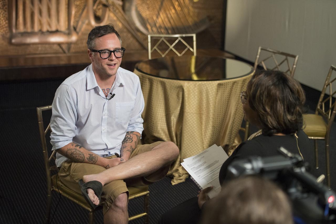 Josh Eppard, drummer for the progressive rock band, Coheed and Cambria is interviewed by NASA TV, Friday, June 1, 2018 at the John F. Kennedy Center for the Performing Arts ahead of the "National Symphony Orchestra Pops: Space, the Next Frontier," celebrating NASA's 60th Anniversary in Washington DC. The event featured music inspired by space including artists Will.i.am, Grace Potter, Coheed & Cambria, John Cho, and guest Nick Sagan, son of Carl Sagan. Photo Credit: (NASA/Aubrey Gemignani)