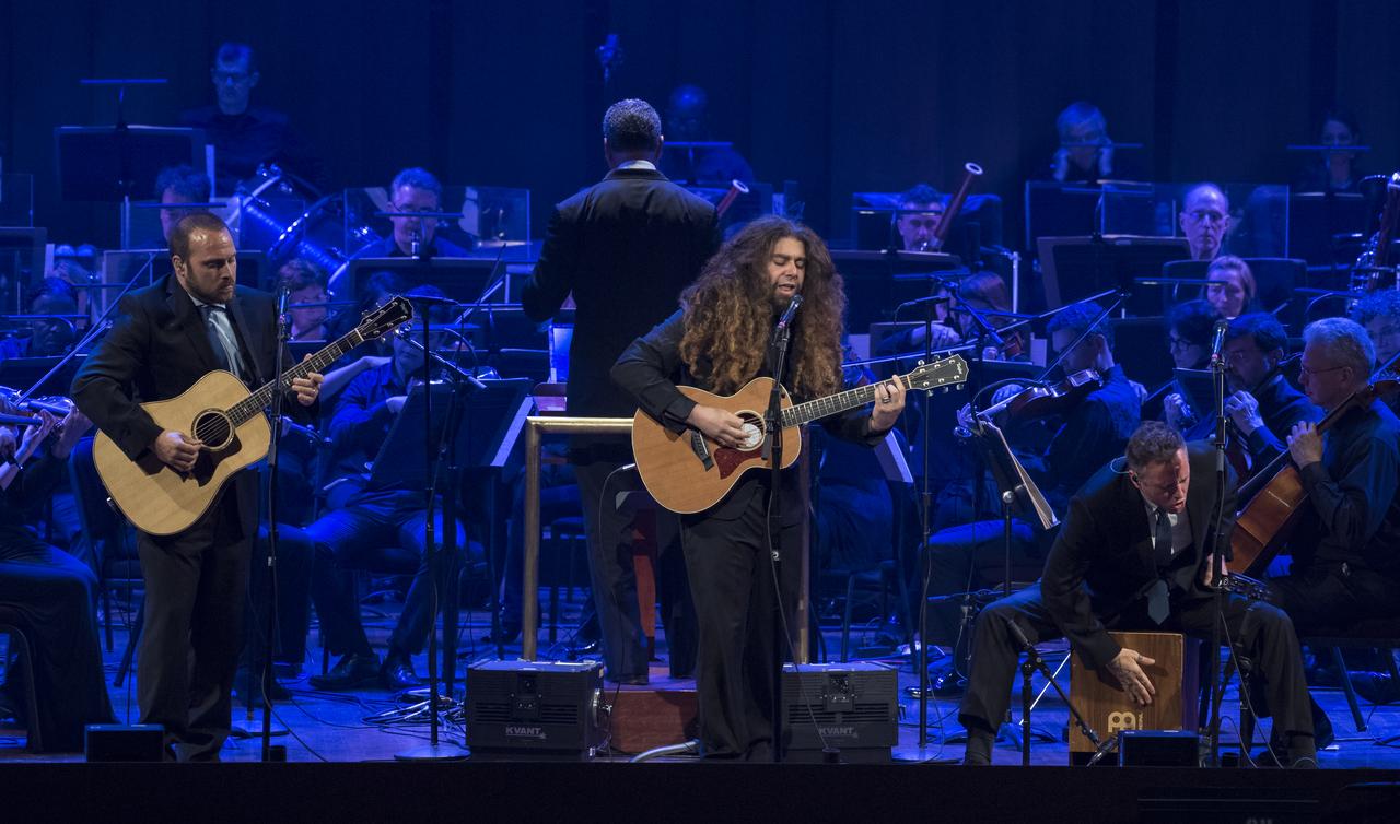 Coheed and Cambria performs at the "National Symphony Orchestra Pops: Space, the Next Frontier" event celebrating NASA's 60th Anniversary, Friday, June 1, 2018 at the John F. Kennedy Center for the Performing Arts in Washington. The event featured music inspired by space including artists will.i.am, Grace Potter, Coheed & Cambria, John Cho, and guest Nick Sagan, son of Carl Sagan. Photo Credit: (NASA/Aubrey Gemignani)