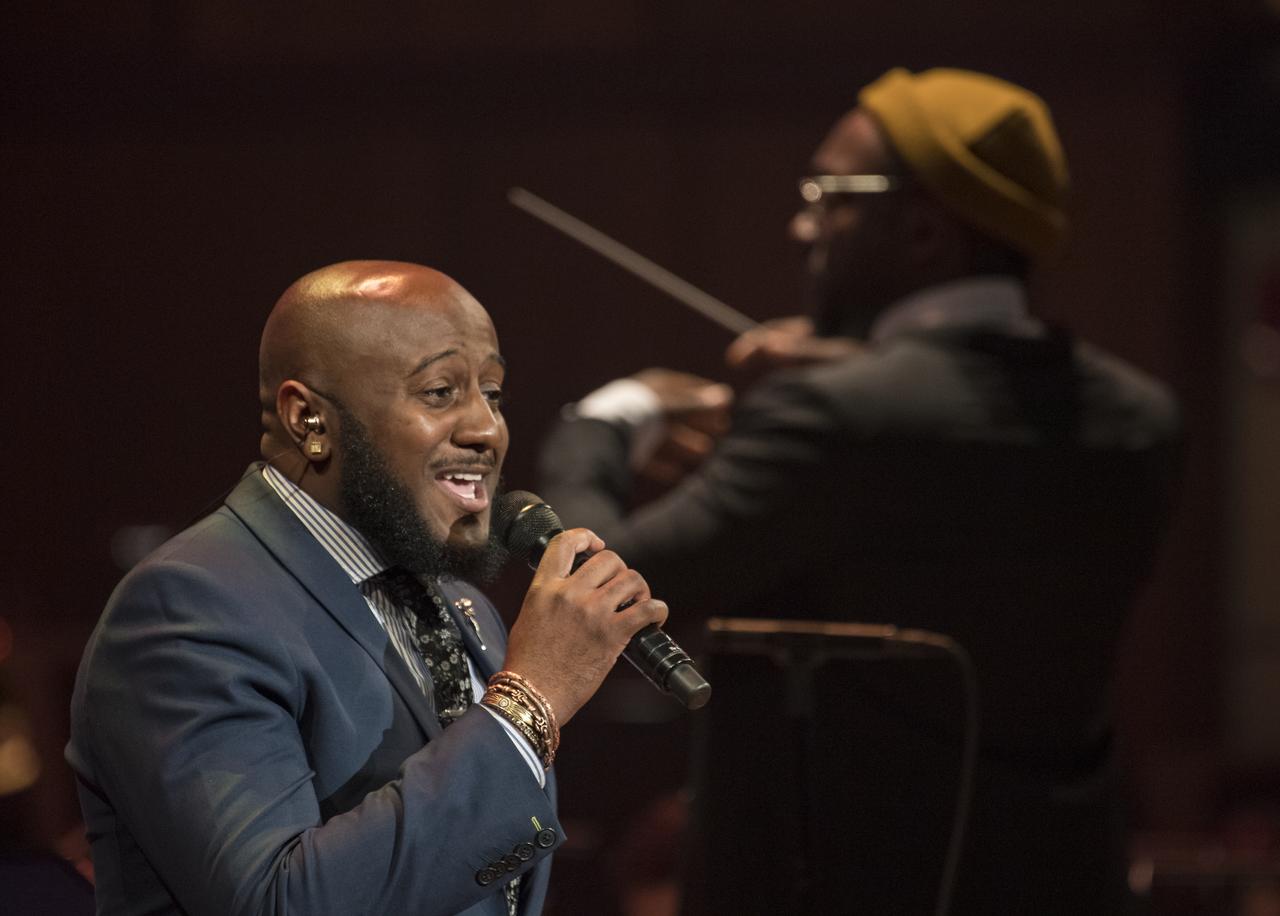 Will.i.am's "Reach for the Stars" is performed while he conducts the National Symphony Orchestra during the "Space, the Next Frontier" event celebrating NASA's 60th Anniversary, Friday, June 1, 2018 at the John F. Kennedy Center for the Performing Arts in Washington. The event featured music inspired by space including artists will.i.am, Grace Potter, Coheed & Cambria, John Cho, and guest Nick Sagan, son of Carl Sagan. Photo Credit: (NASA/Aubrey Gemignani)