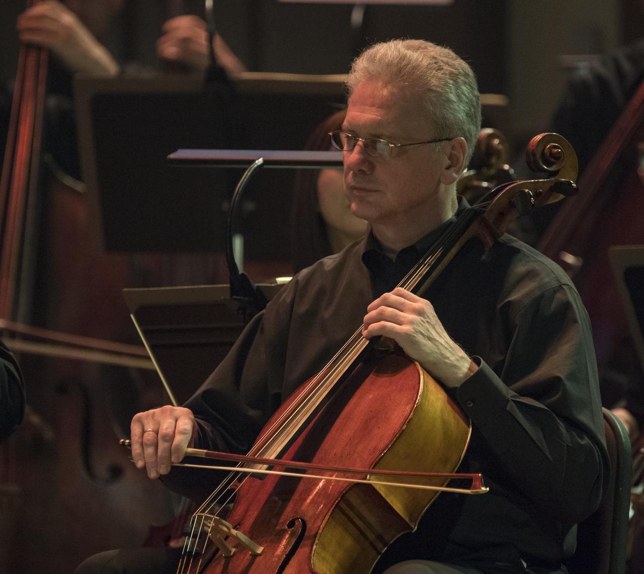 National Symphony Orchestra members are seen performing during the "Space, the Next Frontier" event celebrating NASA's 60th Anniversary, Friday, June 1, 2018 at the John F. Kennedy Center for the Performing Arts in Washington. The event featured music inspired by space including artists will.i.am, Grace Potter, Coheed & Cambria, John Cho, and guest Nick Sagan, son of Carl Sagan. Photo Credit: (NASA/Aubrey Gemignani)