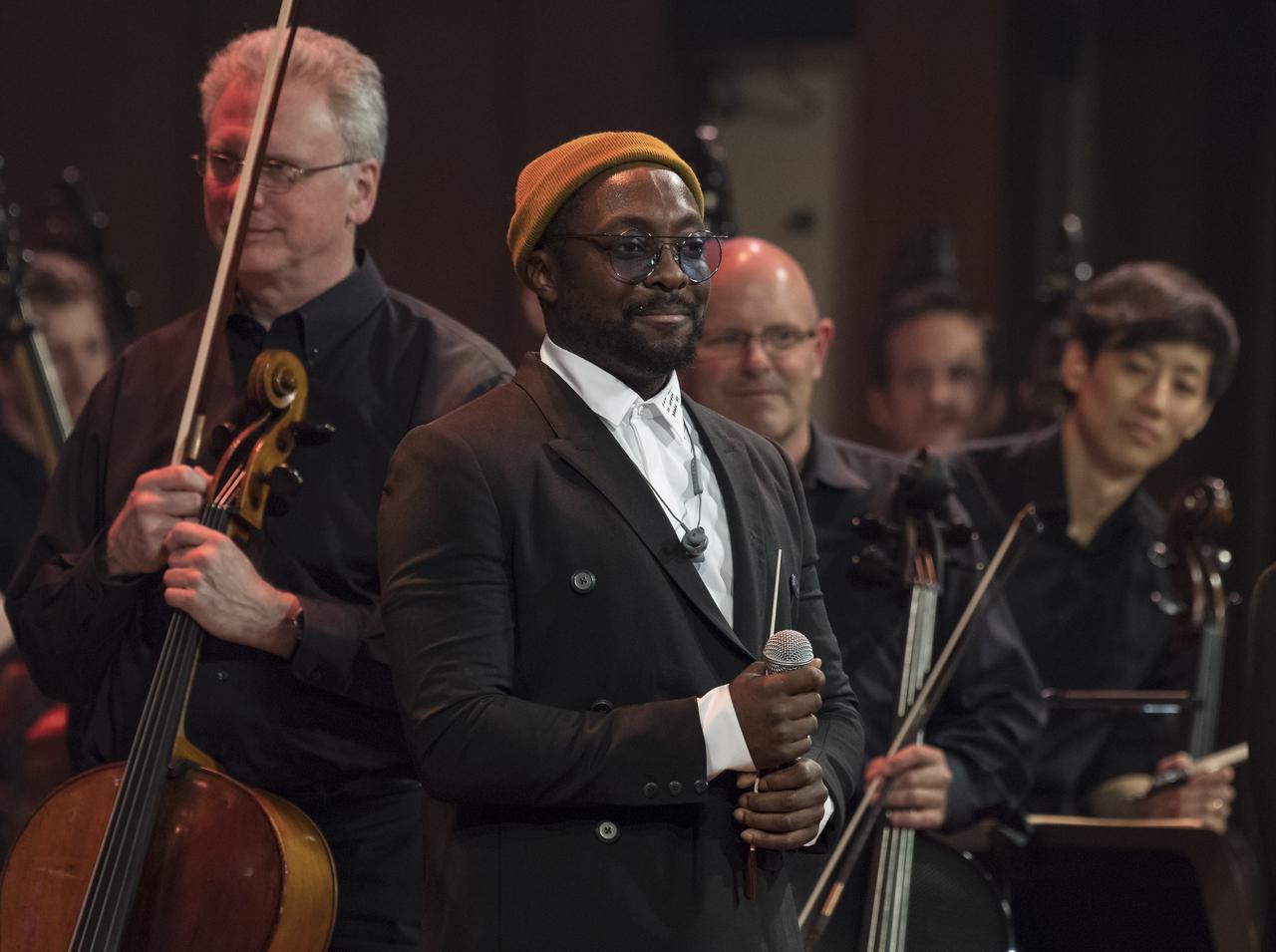 Will.i.am's is seen just after he conducted the National Symphony Orchestra during the "Space, the Next Frontier" event celebrating NASA's 60th Anniversary, Friday, June 1, 2018 at the John F. Kennedy Center for the Performing Arts in Washington. The event featured music inspired by space including artists will.i.am, Grace Potter, Coheed & Cambria, John Cho, and guest Nick Sagan, son of Carl Sagan. Photo Credit: (NASA/Aubrey Gemignani)