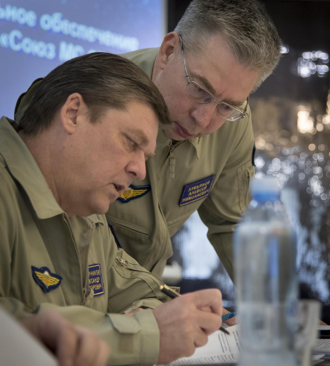 Deputy Director of Rosaviatsiya (Russian Federal Agency for Air Transport) Alexander Vedernikov, left, and Head of the Search-and-Rescue Department of Rosaviatsiya (Russian Federal Air Transport Agency) Aleksey Lukiyanov are seen during a meeting to discuss the readiness for the landing of Expedition 55 crew members  Anton Shkaplerov of Roscosmos, Scott Tingle of NASA, Norishige Kanai of the Japan Aerospace Exploration Agency (JAXA) Saturday, June 2, 2018. Shkaplerov, Tingle, and Kanai are returning after 168 days in space where they served as members of the Expedition 54 and 55 crews onboard the International Space Station. Photo Credit: (NASA/Bill Ingalls)