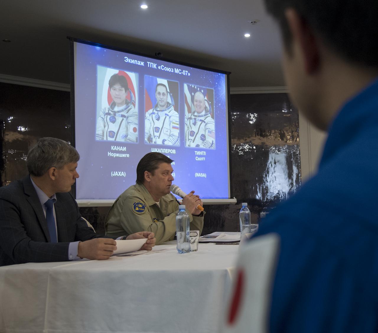 NASA, Roscosmos, and JAXA team members, along with Russian Search and Recovery Forces, meet to discuss the readiness for the landing of Expedition 55 crew members Anton Shkaplerov of Roscosmos, Scott Tingle of NASA, Norishige Kanai of the Japan Aerospace Exploration Agency (JAXA) Saturday, June 2, 2018. Shkaplerov, Tingle, and Kanai are returning after 168 days in space where they served as members of the Expedition 54 and 55 crews onboard the International Space Station. Photo Credit: (NASA/Bill Ingalls)