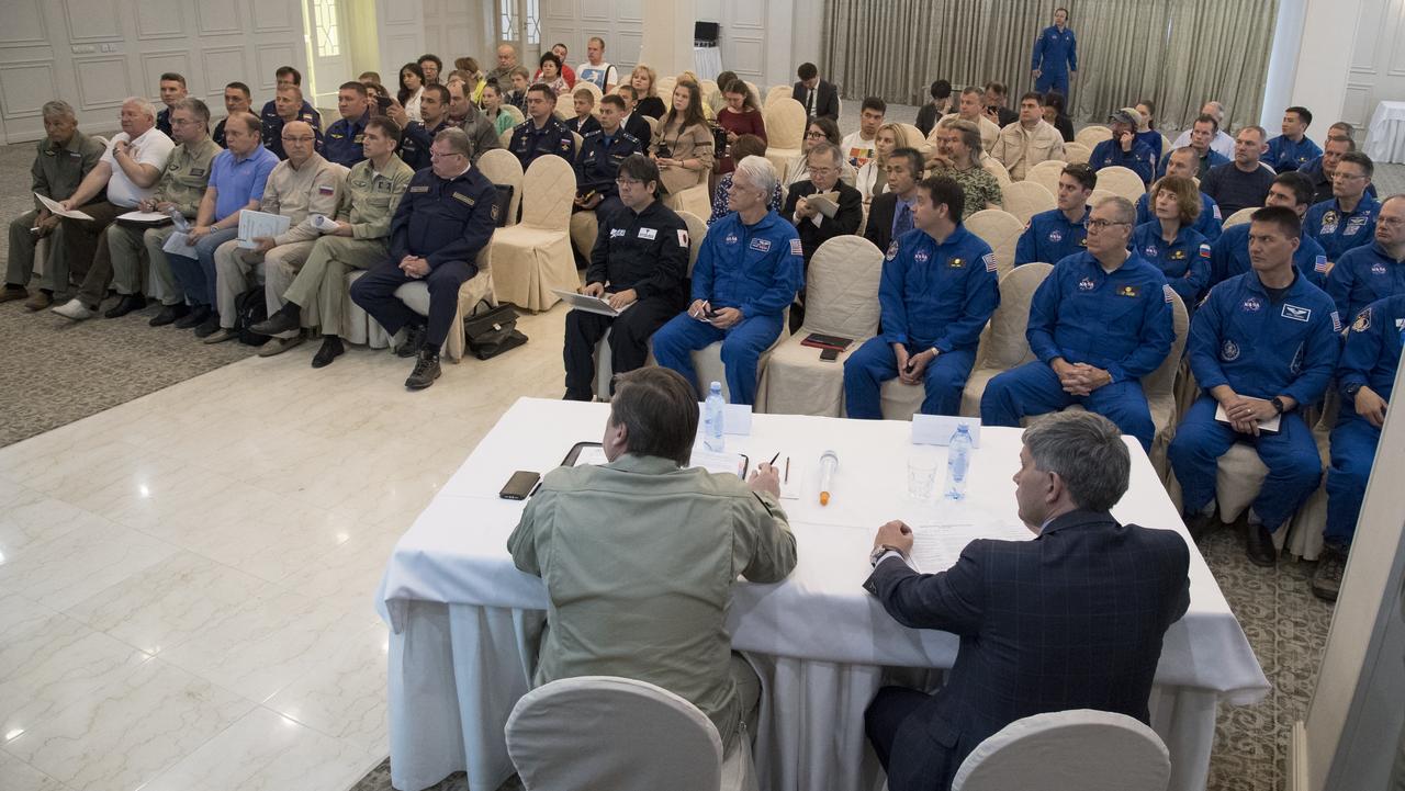 NASA, Roscosmos, and JAXA team members, along with Russian Search and Recovery Forces, meet to discuss the readiness for the landing of Expedition 55 crew members Anton Shkaplerov of Roscosmos, Scott Tingle of NASA, Norishige Kanai of the Japan Aerospace Exploration Agency (JAXA) Saturday, June 2, 2018. Shkaplerov, Tingle, and Kanai are returning after 168 days in space where they served as members of the Expedition 54 and 55 crews onboard the International Space Station. Photo Credit: (NASA/Bill Ingalls)