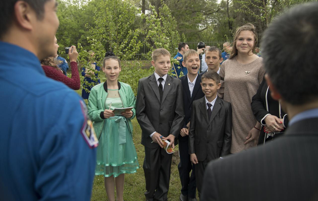 Children from a local orphanage meet with Japan Aerospace Exploration Agency astronauts, Koichi Wakata, and Takuya Onishi, along with NASA astronauts Doug Wheelock, and Kjell Lindgren, at the Cosmonaut Hotel, Saturday, June 2, 2018 in Karaganda, Kazakhstan. The astronauts were in Karaganda to help support the Expedition 55 crew Soyuz landing from the International Space Station. Photo Credit: (NASA/Bill Ingalls)