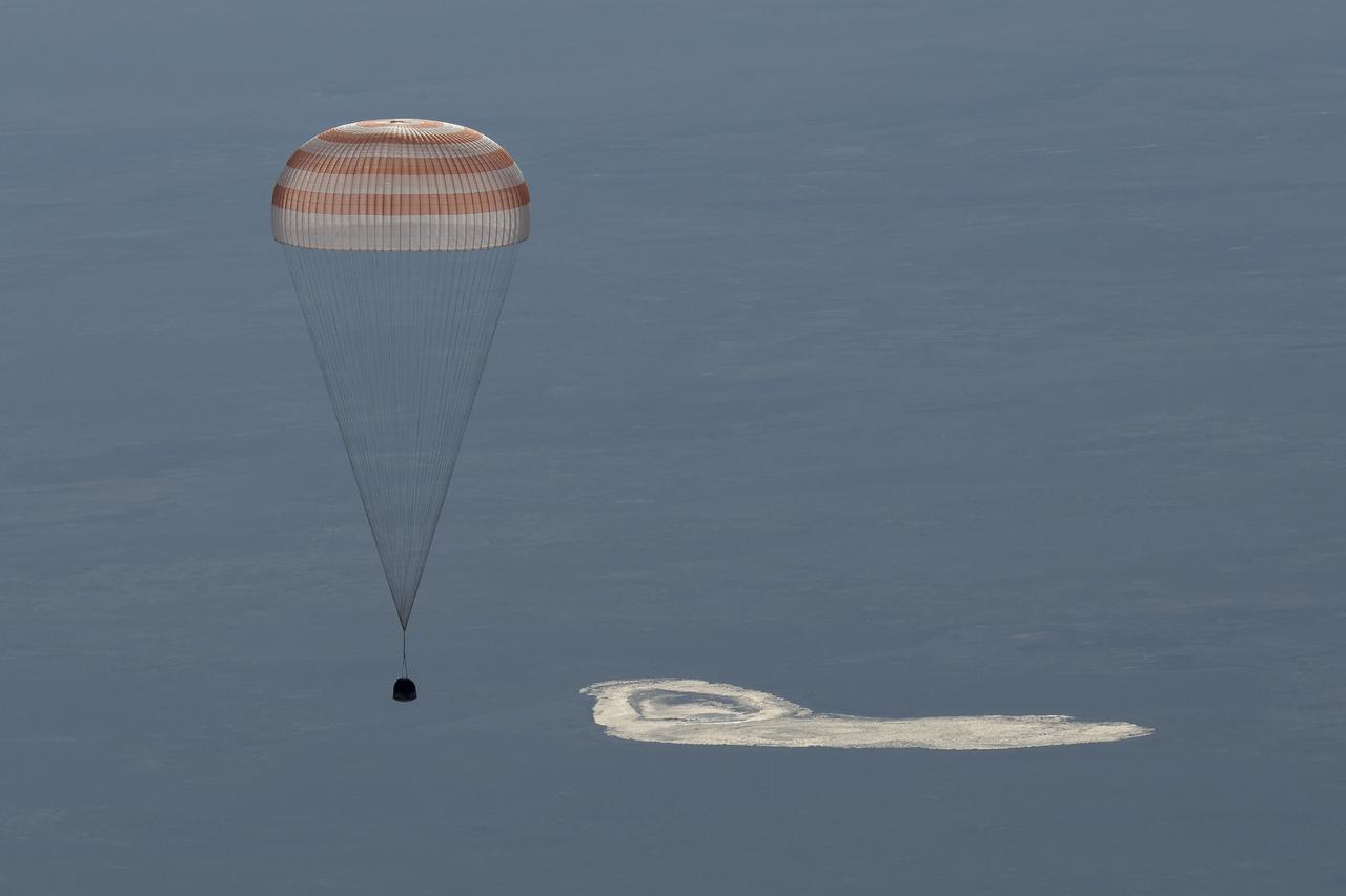 The Soyuz MS-07 spacecraft is seen as it lands with Expedition 55 crew members Anton Shkaplerov of Roscosmos, Scott Tingle of NASA, and Norishige Kanai of the Japan Aerospace Exploration Agency (JAXA) near the town of Zhezkazgan, Kazakhstan on Sunday, June 3, 2018. Shkaplerov, Tingle, and Kanai are returning after 168 days in space where they served as members of the Expedition 54 and 55 crews onboard the International Space Station. Photo Credit: (NASA/Bill Ingalls)
