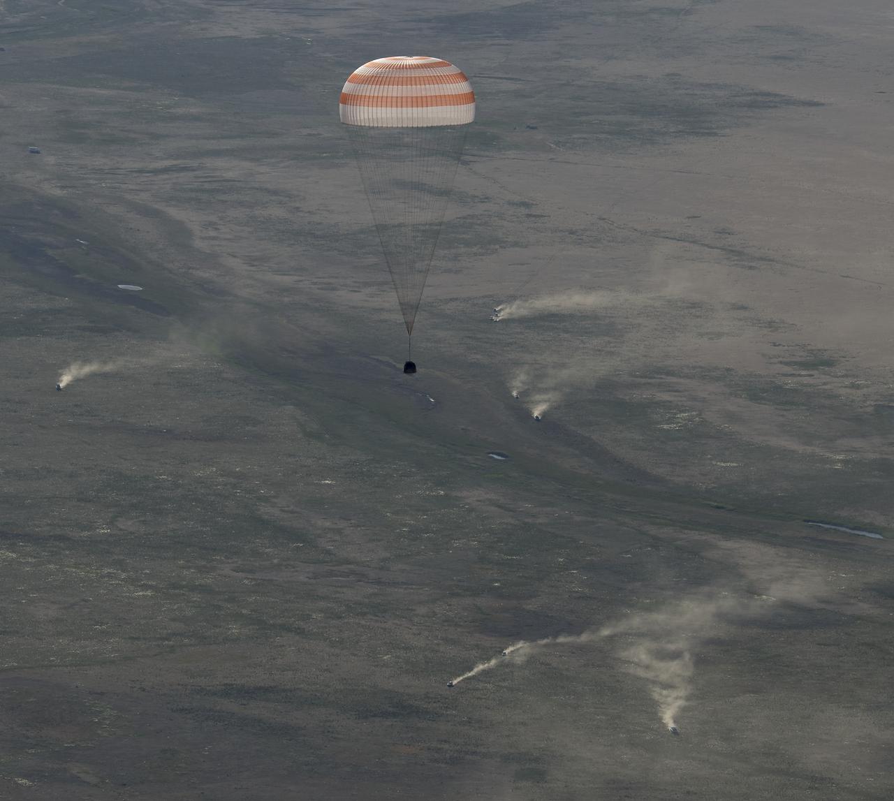 The Soyuz MS-07 spacecraft is seen as it lands with Expedition 55 crew members Anton Shkaplerov of Roscosmos, Scott Tingle of NASA, and Norishige Kanai of the Japan Aerospace Exploration Agency (JAXA) near the town of Zhezkazgan, Kazakhstan on Sunday, June 3, 2018. Shkaplerov, Tingle, and Kanai are returning after 168 days in space where they served as members of the Expedition 54 and 55 crews onboard the International Space Station. Photo Credit: (NASA/Bill Ingalls)