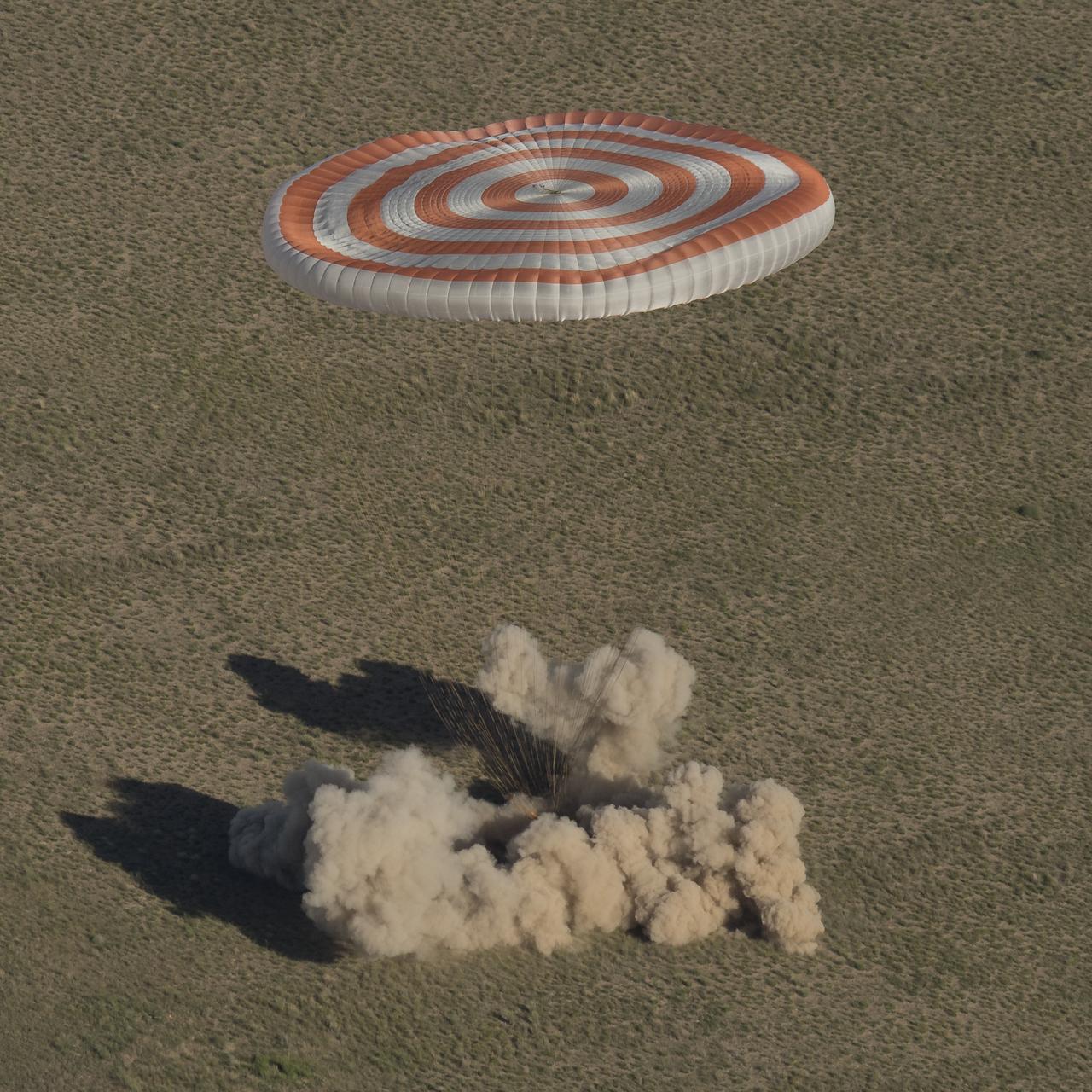 The Soyuz MS-07 spacecraft is seen as it lands with Expedition 55 crew members Anton Shkaplerov of Roscosmos, Scott Tingle of NASA, and Norishige Kanai of the Japan Aerospace Exploration Agency (JAXA) near the town of Zhezkazgan, Kazakhstan on Sunday, June 3, 2018. Shkaplerov, Tingle, and Kanai are returning after 168 days in space where they served as members of the Expedition 54 and 55 crews onboard the International Space Station. Photo Credit: (NASA/Bill Ingalls)
