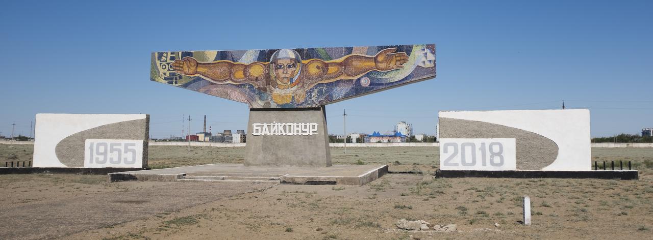 A mosaic welcoming visitors is seen outside the town of Baikonur, Kazakhstan, Sunday, June 3, 2018. Expedition 56 Soyuz Commander Sergey Prokopyev of Roscosmos, flight engineer Serena Auñón-Chancellor of NASA, and flight engineer Alexander Gerst of ESA (European Space Agency) are scheduled to launch aboard their Soyuz MS-09 spacecraft at 7:12 a.m. Eastern time (5:12 p.m. Baikonur time), on Wednesday, June 6.  Photo Credit: (NASA/Joel Kowsky)