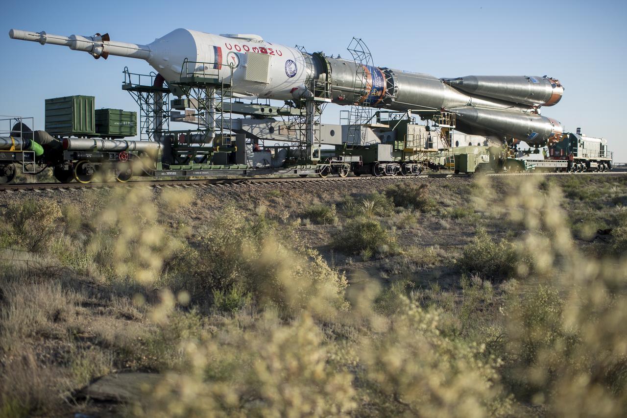 The Soyuz rocket is rolled out by train to the launch pad, Monday, June 4, 2018 at the Baikonur Cosmodrome in Kazakhstan. Expedition 56 Soyuz Commander Sergey Prokopyev of Roscosmos, flight engineer Serena Auñón-Chancellor of NASA, and flight engineer Alexander Gerst of ESA (European Space Agency) are scheduled to launch aboard their Soyuz MS-09 spacecraft at 7:12 a.m. Eastern time (5:12 p.m. Baikonur time), on Wednesday, June 6. Photo Credit: (NASA/Joel Kowsky)