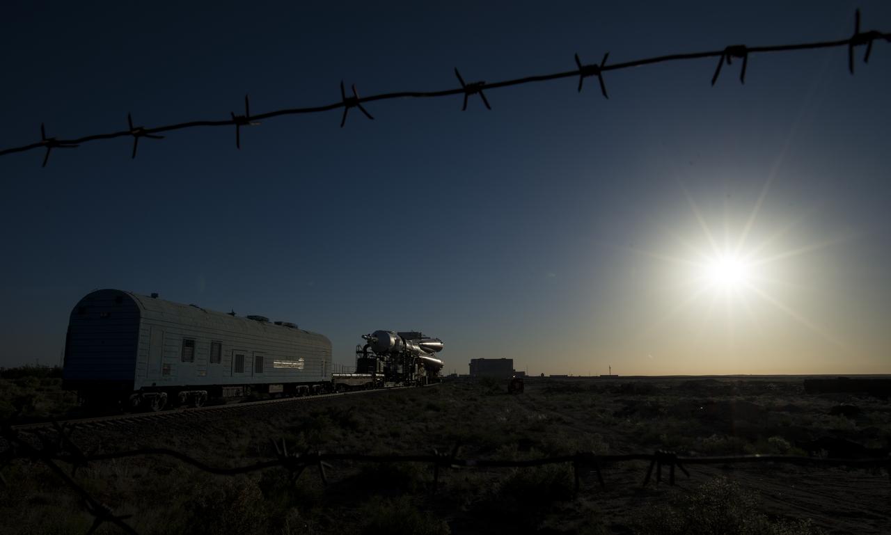 The Soyuz rocket is rolled out by train to the launch pad, Monday, June 4, 2018 at the Baikonur Cosmodrome in Kazakhstan. Expedition 56 Soyuz Commander Sergey Prokopyev of Roscosmos, flight engineer Serena Auñón-Chancellor of NASA, and flight engineer Alexander Gerst of ESA (European Space Agency) are scheduled to launch aboard their Soyuz MS-09 spacecraft at 7:12 a.m. Eastern time (5:12 p.m. Baikonur time), on Wednesday, June 6. Photo Credit: (NASA/Joel Kowsky)