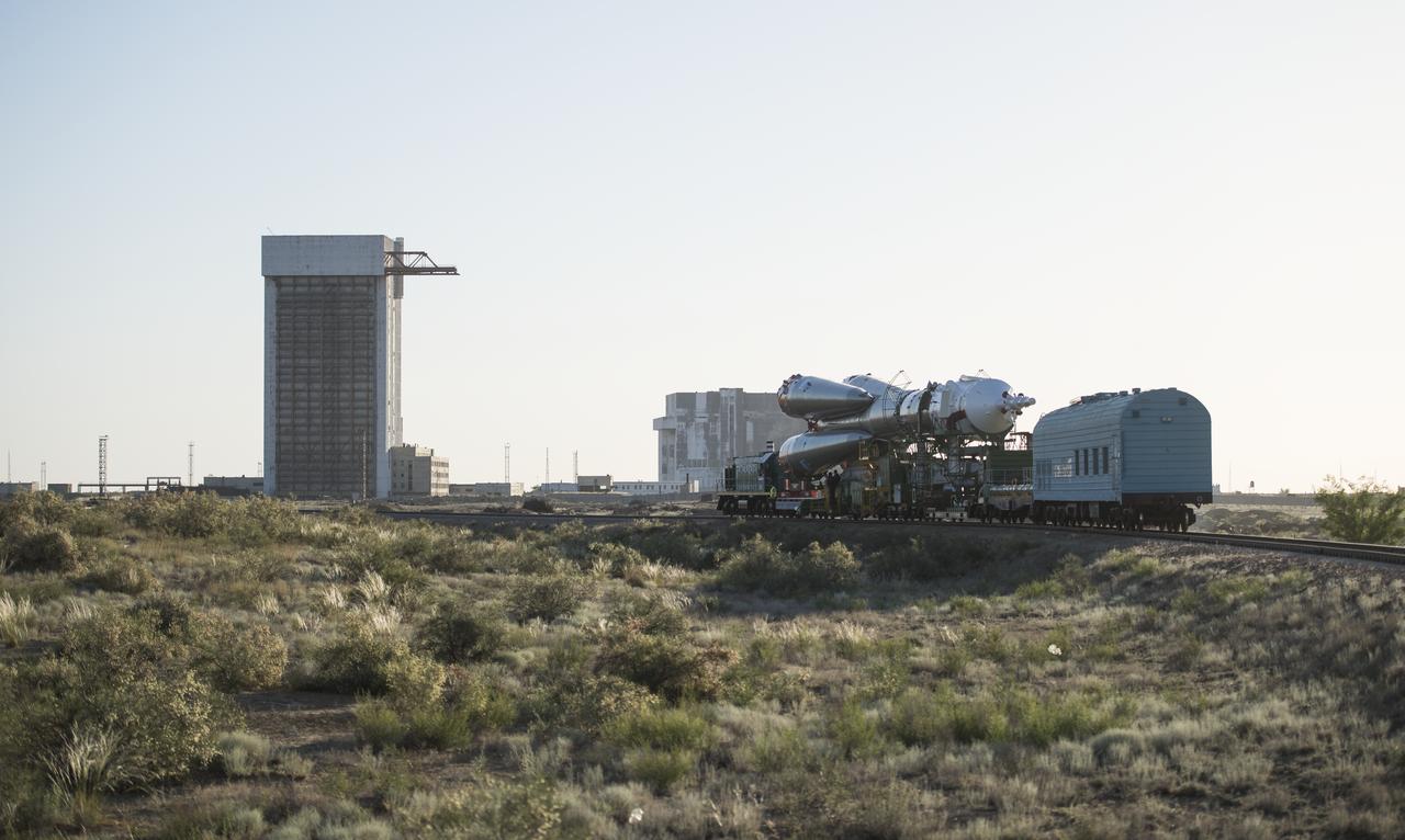 The Soyuz rocket is rolled out by train to the launch pad, Monday, June 4, 2018 at the Baikonur Cosmodrome in Kazakhstan. Expedition 56 Soyuz Commander Sergey Prokopyev of Roscosmos, flight engineer Serena Auñón-Chancellor of NASA, and flight engineer Alexander Gerst of ESA (European Space Agency) are scheduled to launch aboard their Soyuz MS-09 spacecraft at 7:12 a.m. Eastern time (5:12 p.m. Baikonur time), on Wednesday, June 6. Photo Credit: (NASA/Joel Kowsky)