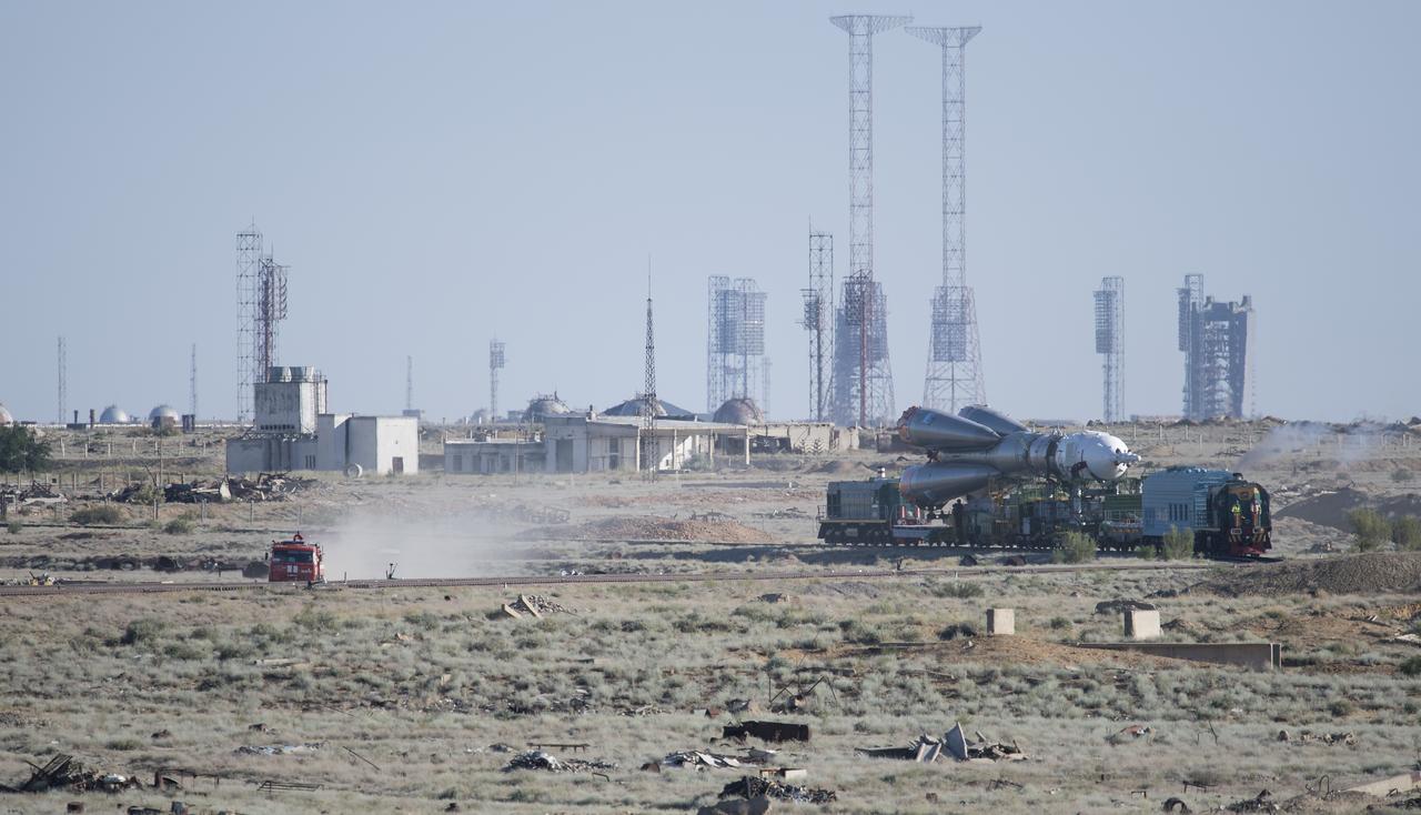 The Soyuz rocket is rolled out by train to the launch pad, Monday, June 4, 2018 at the Baikonur Cosmodrome in Kazakhstan. Expedition 56 Soyuz Commander Sergey Prokopyev of Roscosmos, flight engineer Serena Auñón-Chancellor of NASA, and flight engineer Alexander Gerst of ESA (European Space Agency) are scheduled to launch aboard their Soyuz MS-09 spacecraft at 7:12 a.m. Eastern time (5:12 p.m. Baikonur time), on Wednesday, June 6. Photo Credit: (NASA/Joel Kowsky)
