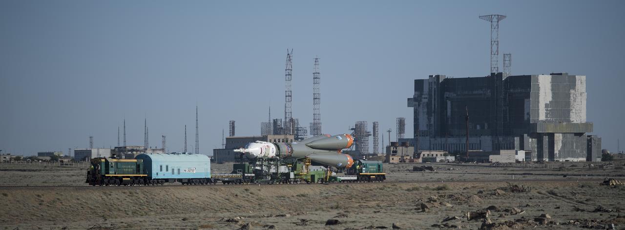 The Soyuz rocket is rolled out by train to the launch pad, Monday, June 4, 2018 at the Baikonur Cosmodrome in Kazakhstan. Expedition 56 Soyuz Commander Sergey Prokopyev of Roscosmos, flight engineer Serena Auñón-Chancellor of NASA, and flight engineer Alexander Gerst of ESA (European Space Agency) are scheduled to launch aboard their Soyuz MS-09 spacecraft at 7:12 a.m. Eastern time (5:12 p.m. Baikonur time), on Wednesday, June 6. Photo Credit: (NASA/Joel Kowsky)