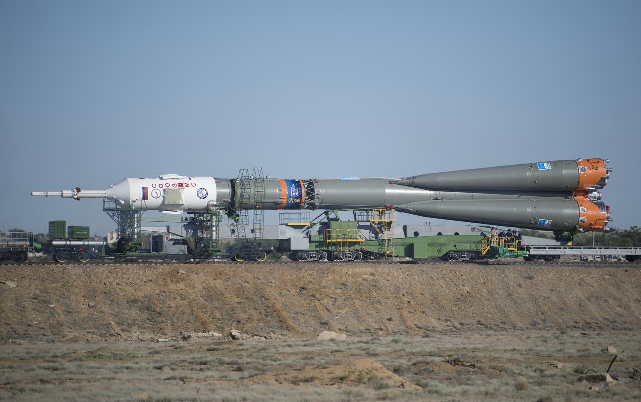 The Soyuz rocket is rolled out by train to the launch pad, Monday, June 4, 2018 at the Baikonur Cosmodrome in Kazakhstan. Expedition 56 Soyuz Commander Sergey Prokopyev of Roscosmos, flight engineer Serena Auñón-Chancellor of NASA, and flight engineer Alexander Gerst of ESA (European Space Agency) are scheduled to launch aboard their Soyuz MS-09 spacecraft at 7:12 a.m. Eastern time (5:12 p.m. Baikonur time), on Wednesday, June 6. Photo Credit: (NASA/Joel Kowsky)