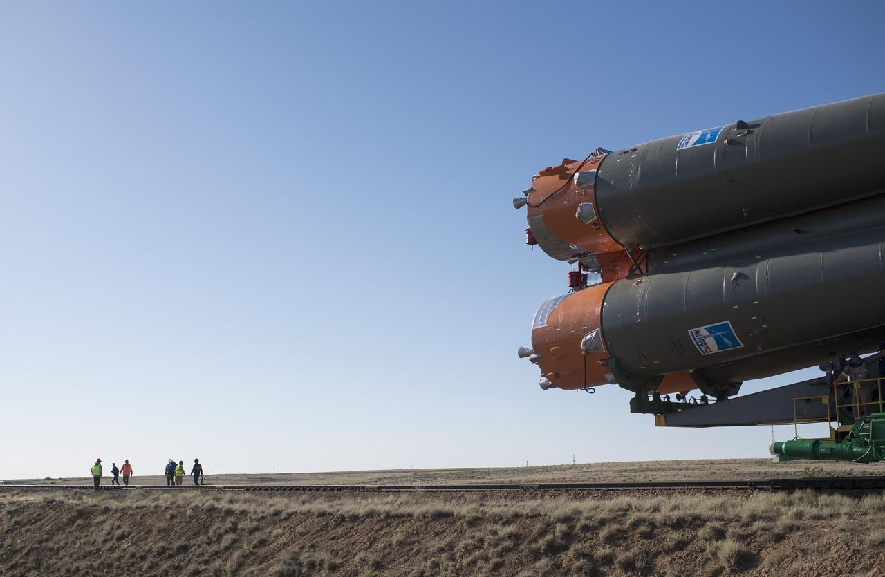 The Soyuz rocket is rolled out by train to the launch pad, Monday, June 4, 2018 at the Baikonur Cosmodrome in Kazakhstan. Expedition 56 Soyuz Commander Sergey Prokopyev of Roscosmos, flight engineer Serena Auñón-Chancellor of NASA, and flight engineer Alexander Gerst of ESA (European Space Agency) are scheduled to launch aboard their Soyuz MS-09 spacecraft at 7:12 a.m. Eastern time (5:12 p.m. Baikonur time), on Wednesday, June 6. Photo Credit: (NASA/Joel Kowsky)
