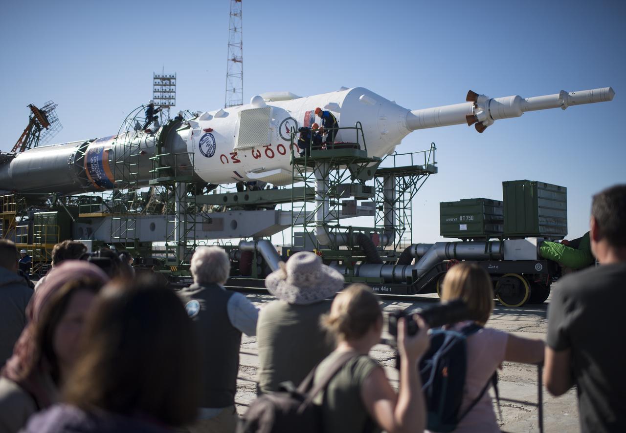 Workers prepare to raise the Soyuz rocket into a vertical position on the launch pad, Monday, June 4, 2018 at the Baikonur Cosmodrome in Kazakhstan. Expedition 56 Soyuz Commander Sergey Prokopyev of Roscosmos, flight engineer Serena Auñón-Chancellor of NASA, and flight engineer Alexander Gerst of ESA (European Space Agency) are scheduled to launch aboard their Soyuz MS-09 spacecraft at 7:12 a.m. Eastern time (5:12 p.m. Baikonur time), on Wednesday, June 6. Photo Credit: (NASA/Joel Kowsky)
