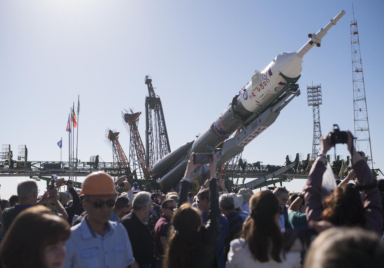The Soyuz rocket is raised into a vertical position on the launch pad, Monday, June 4, 2018 at the Baikonur Cosmodrome in Kazakhstan. Expedition 56 Soyuz Commander Sergey Prokopyev of Roscosmos, flight engineer Serena Auñón-Chancellor of NASA, and flight engineer Alexander Gerst of ESA (European Space Agency) are scheduled to launch aboard their Soyuz MS-09 spacecraft at 7:12 a.m. Eastern time (5:12 p.m. Baikonur time), on Wednesday, June 6. Photo Credit: (NASA/Joel Kowsky)