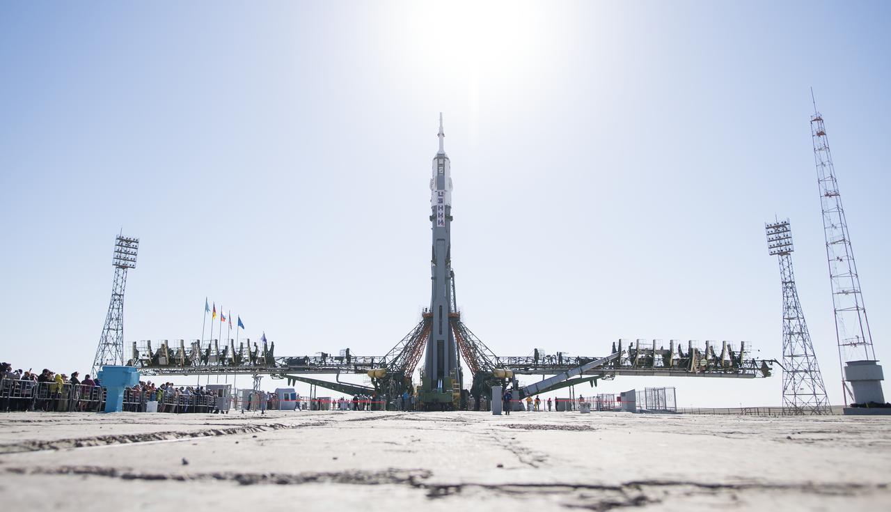 The Soyuz rocket is seen after being raised into a vertical position on the launch pad, Monday, June 4, 2018 at the Baikonur Cosmodrome in Kazakhstan. Expedition 56 Soyuz Commander Sergey Prokopyev of Roscosmos, flight engineer Serena Auñón-Chancellor of NASA, and flight engineer Alexander Gerst of ESA (European Space Agency) are scheduled to launch aboard their Soyuz MS-09 spacecraft at 7:12 a.m. Eastern time (5:12 p.m. Baikonur time), on Wednesday, June 6. Photo Credit: (NASA/Joel Kowsky)