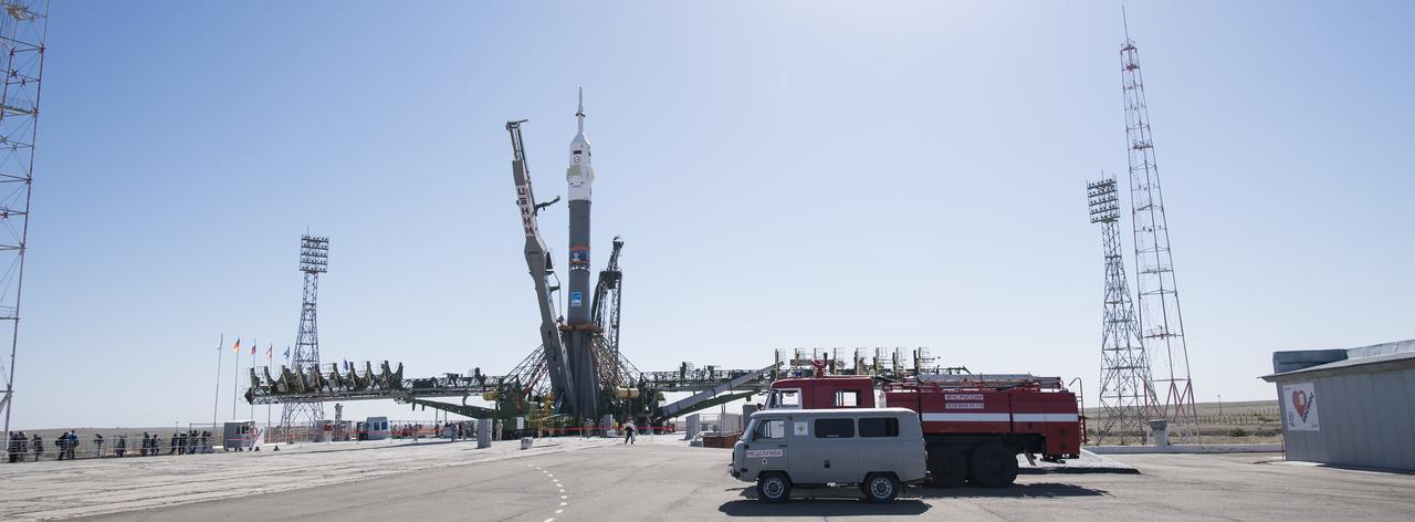 The Soyuz rocket is seen after being raised into a vertical position on the launch pad, Monday, June 4, 2018 at the Baikonur Cosmodrome in Kazakhstan. Expedition 56 Soyuz Commander Sergey Prokopyev of Roscosmos, flight engineer Serena Auñón-Chancellor of NASA, and flight engineer Alexander Gerst of ESA (European Space Agency) are scheduled to launch aboard their Soyuz MS-09 spacecraft at 7:12 a.m. Eastern time (5:12 p.m. Baikonur time), on Wednesday, June 6. Photo Credit: (NASA/Joel Kowsky)