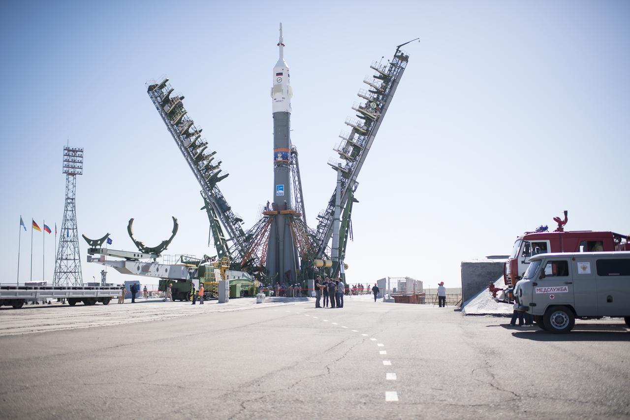 The Soyuz rocket is seen on the launch pad as the service structure arms are closed around it, Monday, June 4, 2018 at the Baikonur Cosmodrome in Kazakhstan. Expedition 56 Soyuz Commander Sergey Prokopyev of Roscosmos, flight engineer Serena Auñón-Chancellor of NASA, and flight engineer Alexander Gerst of ESA (European Space Agency) are scheduled to launch aboard their Soyuz MS-09 spacecraft at 7:12 a.m. Eastern time (5:12 p.m. Baikonur time), on Wednesday, June 6. Photo Credit: (NASA/Joel Kowsky)