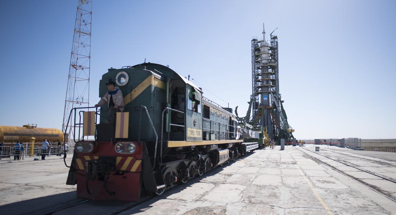 The Soyuz rocket is seen on the launch pad after the service structure arms were closed around it, Monday, June 4, 2018 at the Baikonur Cosmodrome in Kazakhstan. Expedition 56 Soyuz Commander Sergey Prokopyev of Roscosmos, flight engineer Serena Auñón-Chancellor of NASA, and flight engineer Alexander Gerst of ESA (European Space Agency) are scheduled to launch aboard their Soyuz MS-09 spacecraft at 7:12 a.m. Eastern time (5:12 p.m. Baikonur time), on Wednesday, June 6. Photo Credit: (NASA/Joel Kowsky)