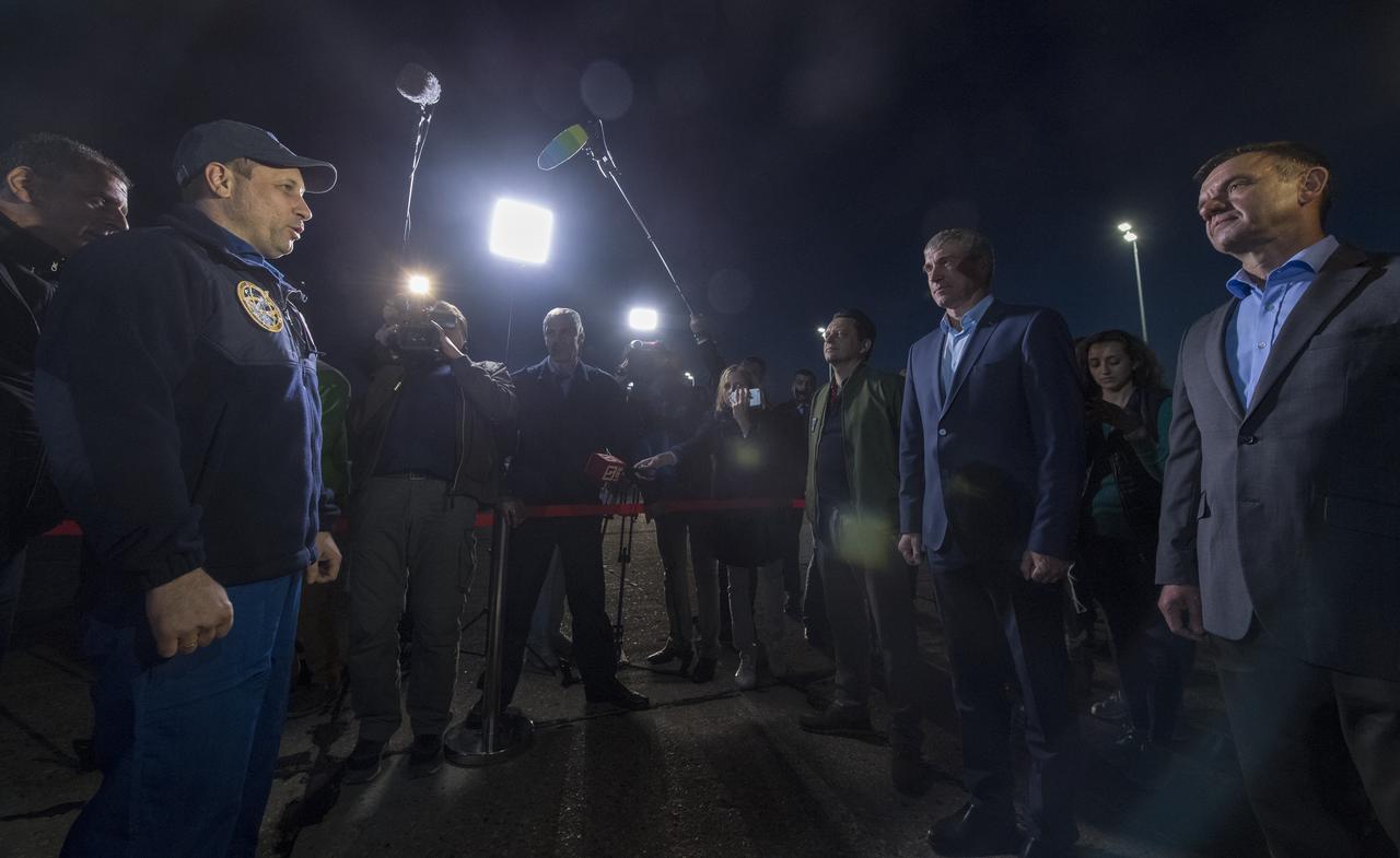 Officials, family, and media gather to welcome home Expedition 55 cosmonaut Anton Shkaplerov of Roscosmos, left, after he and NASA astronauts Scott Tingle of NASA, and Norishige Kanai of the Japan Aerospace Exploration Agency (JAXA) landed their Soyuz MS-07 capsule near the town of Zhezkazgan, Kazakhstan on Monday, June 4, 2018. Shkaplerov, Tingle, and Kanai are returning after 168 days in space where they served as members of the Expedition 54 and 55 crews onboard the International Space Station. Photo Credit: (NASA/Bill Ingalls)