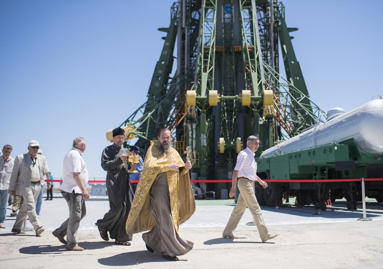An Orthodox Priest is seen after blessing the Soyuz rocket at the Baikonur Cosmodrome launch pad, Tuesday, June 5, 2018 in Baikonur, Kazakhstan. Expedition 56 Soyuz Commander Sergey Prokopyev of Roscosmos, flight engineer Serena Auñón-Chancellor of NASA, and flight engineer Alexander Gerst of ESA (European Space Agency) are scheduled to launch to the International Space Station aboard the Soyuz MS-09 spacecraft on Wednesday, June 6.  Photo Credit: (NASA/Joel Kowsky)