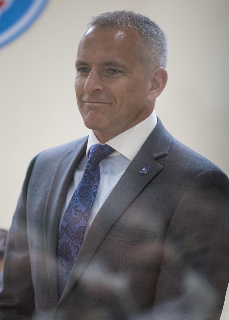 Expedition 56 backup crew member David Saint-Jacques of the Canadian Space Agency is seen during the State Commission meeting to approve the Soyuz launch of Expedition 56 to the International Space Station, Tuesday, June 5, 2018 at the Cosmonaut Hotel in Baikonur, Kazakhstan. Expedition 56 Soyuz Commander Sergey Prokopyev of Roscosmos, Serena Auñón-Chancellor of NASA, and Alexander Gerst of ESA (European Space Agency) are scheduled to launch to the International Space Station aboard the Soyuz MS-09 spacecraft on Wednesday, June 6. Photo Credit: (NASA/Joel Kowsky)
