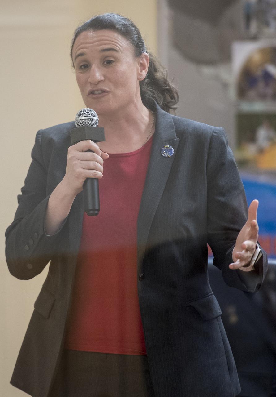 Expedition 56 flight engineer Serena Auñón-Chancellor of NASA is seen during the State Commission meeting to approve the Soyuz launch of Expedition 56 to the International Space Station, Tuesday, June 5, 2018. Auñón-Chancellor, Soyuz Commander Sergey Prokopyev of Roscosmos, and Alexander Gerst of ESA (European Space Agency) are scheduled to launch to the International Space Station aboard the Soyuz MS-09 spacecraft on Wednesday, June 6. Photo Credit: (NASA/Joel Kowsky)