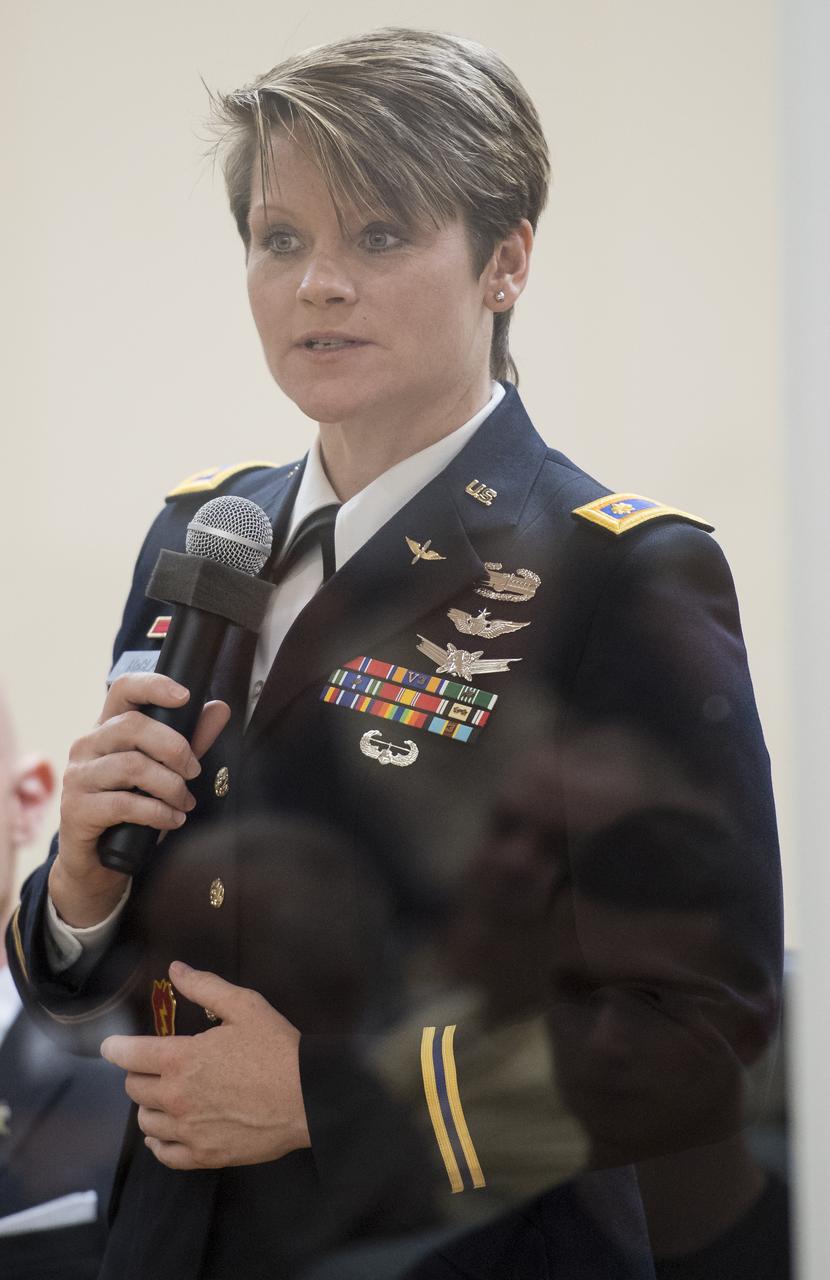 Expedition 56 backup crew member Anne McClain of NASA is seen during the State Commission meeting to approve the Soyuz launch of Expedition 56 to the International Space Station, Tuesday, June 5, 2018. Expedition 56 Soyuz Commander Sergey Prokopyev of Roscosmos, Serena Auñón-Chancellor of NASA, and Alexander Gerst of ESA (European Space Agency) are scheduled to launch to the International Space Station aboard the Soyuz MS-09 spacecraft on Wednesday, June 6. Photo Credit: (NASA/Joel Kowsky)