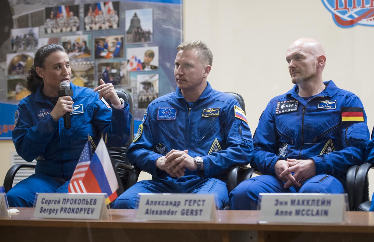 Expedition 56 flight engineer Serena Auñón-Chancellor of NASA, left, answers a question during a press conference along with Soyuz Commander Sergey Prokopyev of Roscosmos, center, and flight engineer Alexander Gerst of ESA (European Space Agency), right, Tuesday, June 5, 2018 a the Cosmonaut Hotel in Baikonur, Kazakhstan. Auñón-Chancellor, Prokopyev, and Gerst are scheduled to launch to the International Space Station aboard the Soyuz MS-09 spacecraft on Wednesday, June 6.  Photo Credit: (NASA/Joel Kowsky)