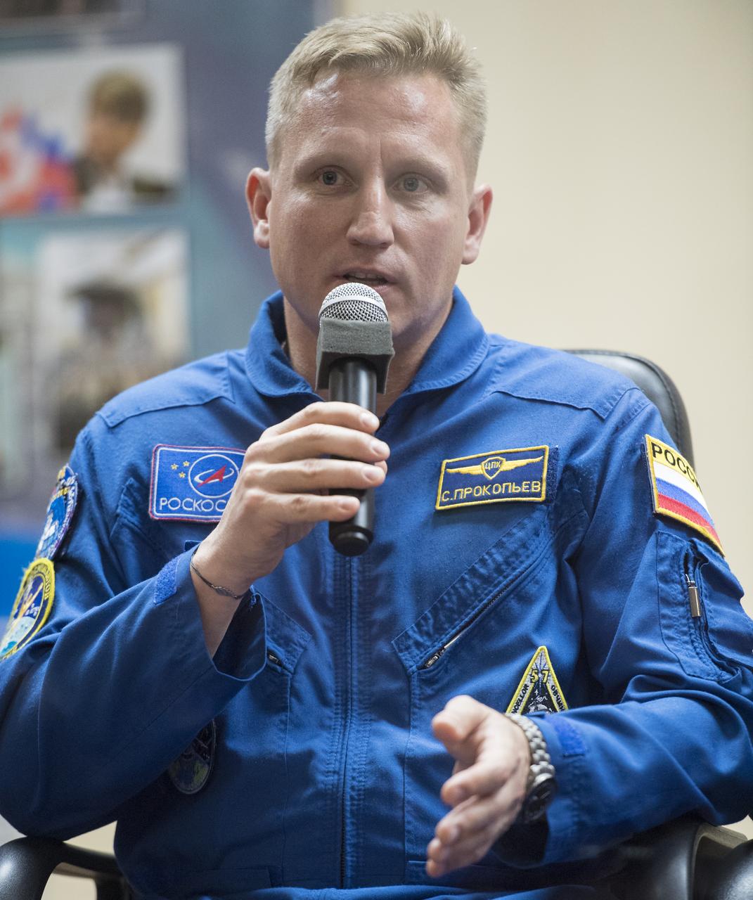 Expedition 56 Soyuz Commander Sergey Prokopyev of Roscosmos answers a question during a press conference, Tuesday, June 5, 2018 a the Cosmonaut Hotel in Baikonur, Kazakhstan. Prokopyev, flight engineer Serena Auñón-Chancellor of NASA, and flight engineer Alexander Gerst of ESA (European Space Agency) are scheduled to launch to the International Space Station aboard the Soyuz MS-09 spacecraft on Wednesday, June 6.  Photo Credit: (NASA/Joel Kowsky)
