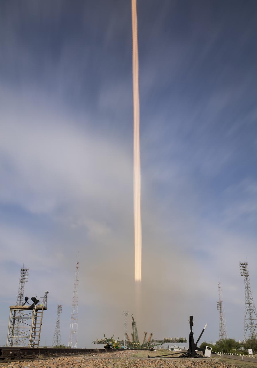 In this long exposure photograph, the Soyuz MS-09 rocket is seen as it is launched with Expedition 56 Soyuz Commander Sergey Prokopyev of Roscosmos, flight engineer Serena Auñón-Chancellor of NASA, and flight engineer Alexander Gerst of ESA (European Space Agency), Wednesday, June 6, 2018 at the Baikonur Cosmodrome in Kazakhstan. Prokopyev, Auñón-Chancellor, and Gerst will spend the next six months living and working aboard the International Space Station.  Photo Credit: (NASA/Joel Kowsky)