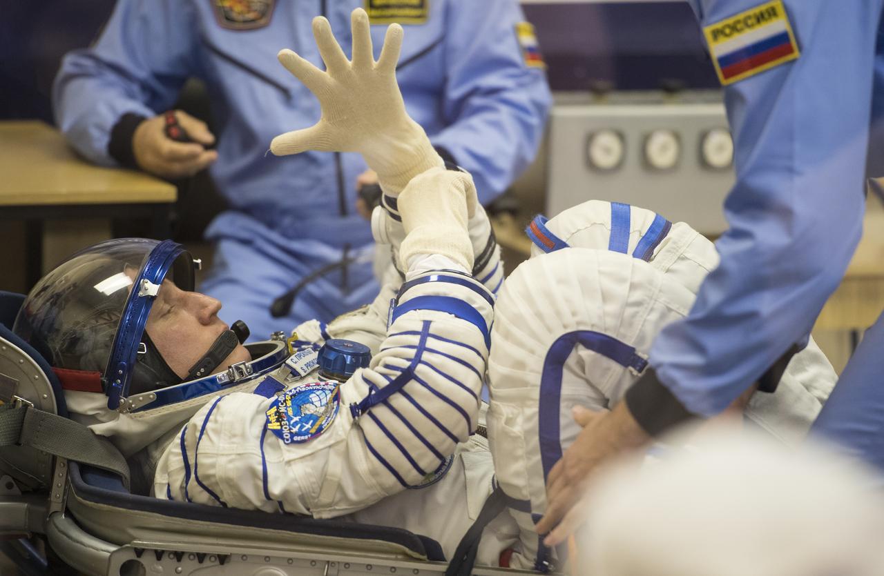 Expedition 56 Soyuz Commander Sergey Prokopyev of Roscosmos prepares to have his Russian Sokol suit pressure checked in preparation for launch aboard the Soyuz MS-09 spacecraft, Wednesday, June 6, 2018 at the Baikonur Cosmodrome in Kazakhstan. Prokopyev, flight engineer Serena Auñón-Chancellor of NASA, and flight engineer Alexander Gerst of ESA (European Space Agency) launched aboard the Soyuz MS-09 spacecraft at 7:12am EDT (5:12pm Baikonur time) on June 6 to begin their journey to the International Space Station.  Photo Credit: (NASA/Joel Kowsky)