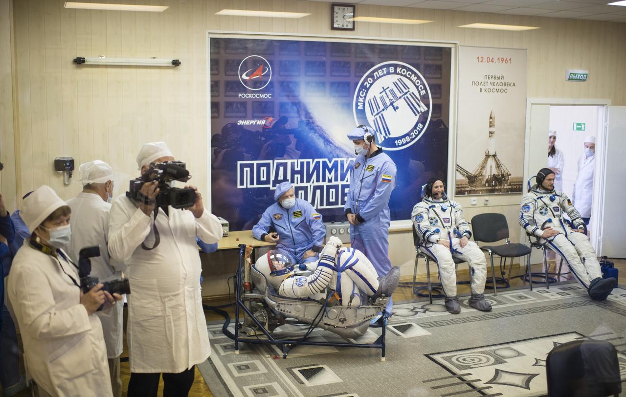 Expedition 56 Soyuz Commander Sergey Prokopyev of Roscosmos has his Russian Sokol suit pressure checked in preparation for launch aboard the Soyuz MS-09 spacecraft, Wednesday, June 6, 2018 at the Baikonur Cosmodrome in Kazakhstan. Prokopyev, flight engineer Serena Auñón-Chancellor of NASA, and flight engineer Alexander Gerst of ESA (European Space Agency) launched aboard the Soyuz MS-09 spacecraft at 7:12am EDT (5:12pm Baikonur time) on June 6 to begin their journey to the International Space Station.  Photo Credit: (NASA/Joel Kowsky)
