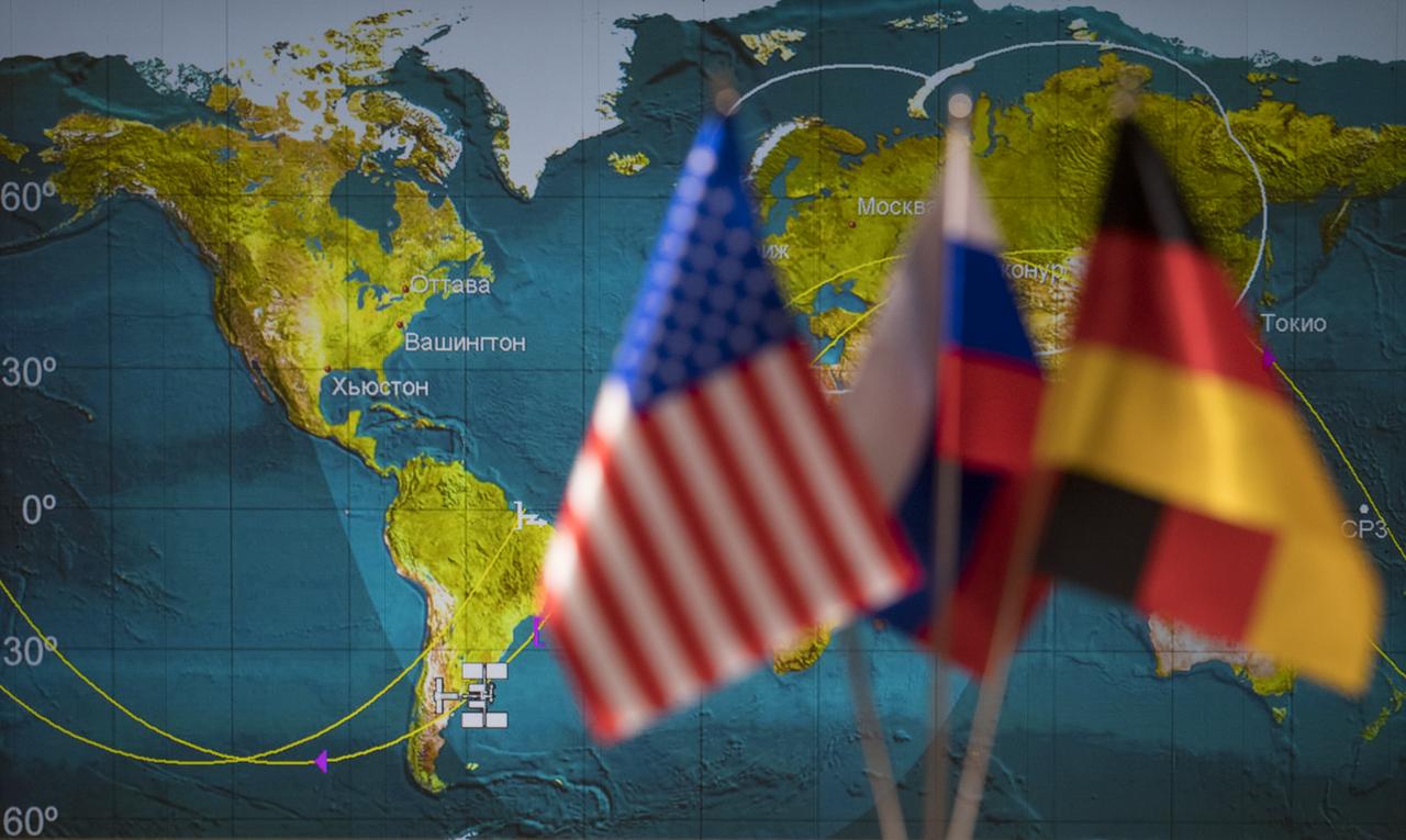 Icons for the International Space Station and Soyuz MS-09 spacecraft are seen on a tracking map on a screen in the Moscow Mission Control Center as the spacecraft approaches for docking, Friday, June 8, 2018 in Korolev, Russia. The Soyuz MS-09 spacecraft carrying Serena Auñón-Chancellor of NASA, Sergey Prokopyev of Roscosmos, and Alexander Gerst of ESA (European Space Agency) docked at 9:01am EDT (4:01pm Moscow time) to the Rassvet module of the International Space Station to join Expedition 56 Commander Drew Feustel of NASA and flight engineers Ricky Arnold of NASA and Oleg Artemyev of Roscosmos. Photo Credit: (NASA/Joel Kowsky)