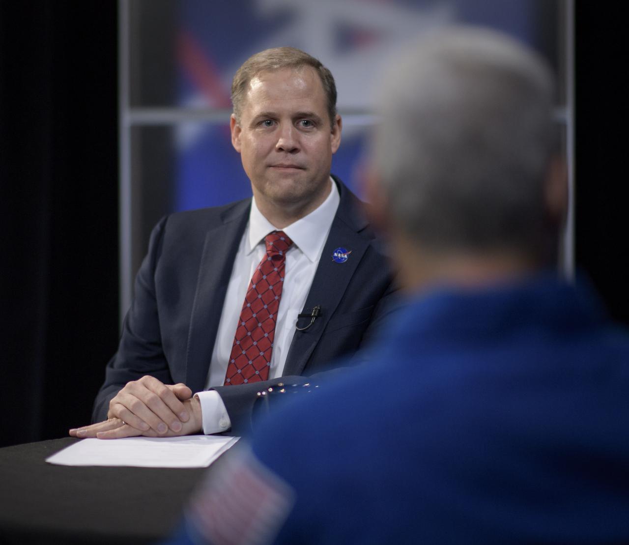 NASA Administrator Jim Bridenstine is seen as he meets with Expedition 54 NASA astronauts Joe Acaba and Mark Vande Hei during their Expedition 54 post flight, Wednesday, June 13, 2018 at NASA Headquarters, Washington. Photo Credit: (NASA/Bill Ingalls)