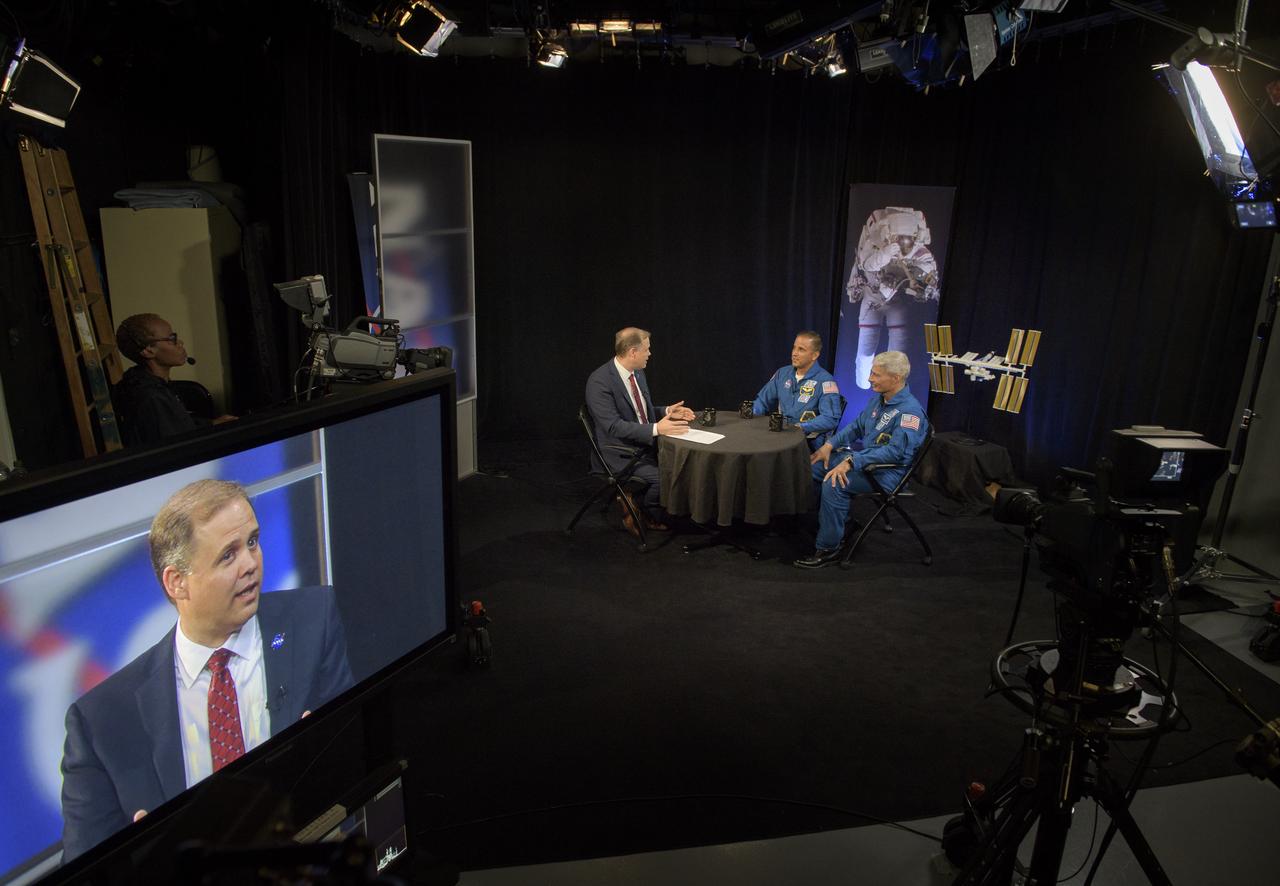 NASA Administrator Jim Bridenstine, left, meets with Expedition 54 NASA astronauts Joe Acaba, center, and Mark Vande Hei during their Expedition 54 post flight, Wednesday, June 13, 2018 at NASA Headquarters, Washington. Photo Credit: (NASA/Bill Ingalls)