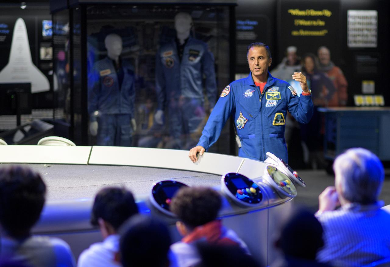 NASA astronaut Joe Acaba answers an audience members question prior to a presentation, Thursday, June 14, 2018 at the Smithsonian National Air and Space Museum in Washington. Acaba and astronaut Mark Vande Hei answered questions from the audience and spoke about their experiences aboard the International Space Station for 168 days as part of Expedition 53 and 54. Photo Credit: (NASA/Joel Kowsky)