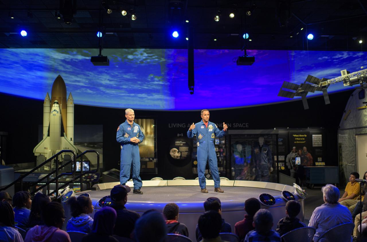 NASA astronauts Mark Vande Hei, left, and Joe Acaba speak about their experiences onboard the International Space Station during "What's New in Aerospace," Thursday, June 14, 2018 at the Smithsonian National Air and Space Museum in Washington. Acaba and Vande Hei answered questions from the audience and spoke about their experiences aboard the International Space Station for 168 days as part of Expedition 53 and 54. Photo Credit: (NASA/Joel Kowsky)