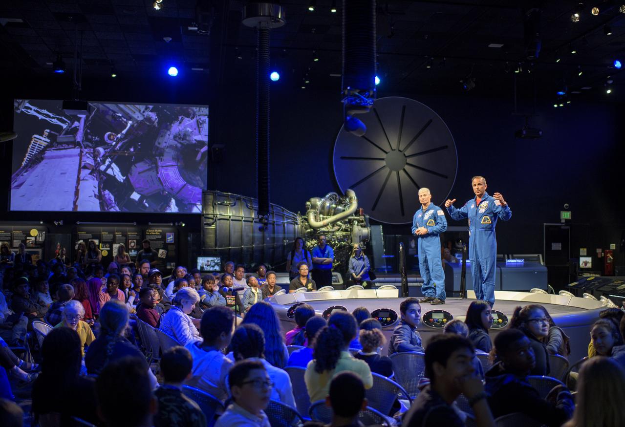 NASA astronauts Mark Vande Hei, left, and Joe Acaba speak about their experiences onboard the International Space Station during "What's New in Aerospace," Thursday, June 14, 2018 at the Smithsonian National Air and Space Museum in Washington. Acaba and Vande Hei answered questions from the audience and spoke about their experiences aboard the International Space Station for 168 days as part of Expedition 53 and 54. Photo Credit: (NASA/Joel Kowsky)