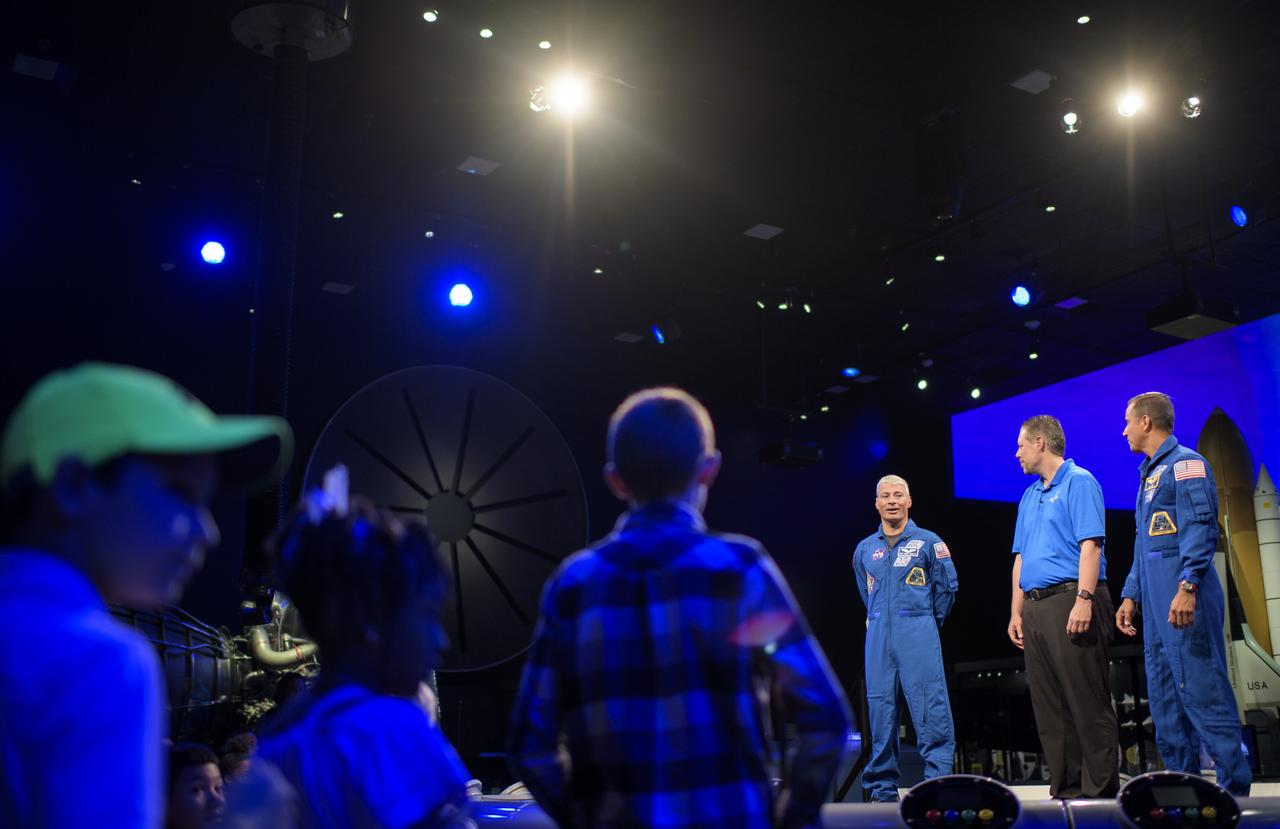 NASA astronauts Mark Vande Hei, left, and Joe Acaba right, answer audience questions with the Smithsonian's Marty Kelsey, center, during "What's New in Aerospace," Thursday, June 14, 2018 at the Smithsonian National Air and Space Museum in Washington. Acaba and Vande Hei answered questions from the audience and spoke about their experiences aboard the International Space Station for 168 days as part of Expedition 53 and 54. Photo Credit: (NASA/Joel Kowsky)