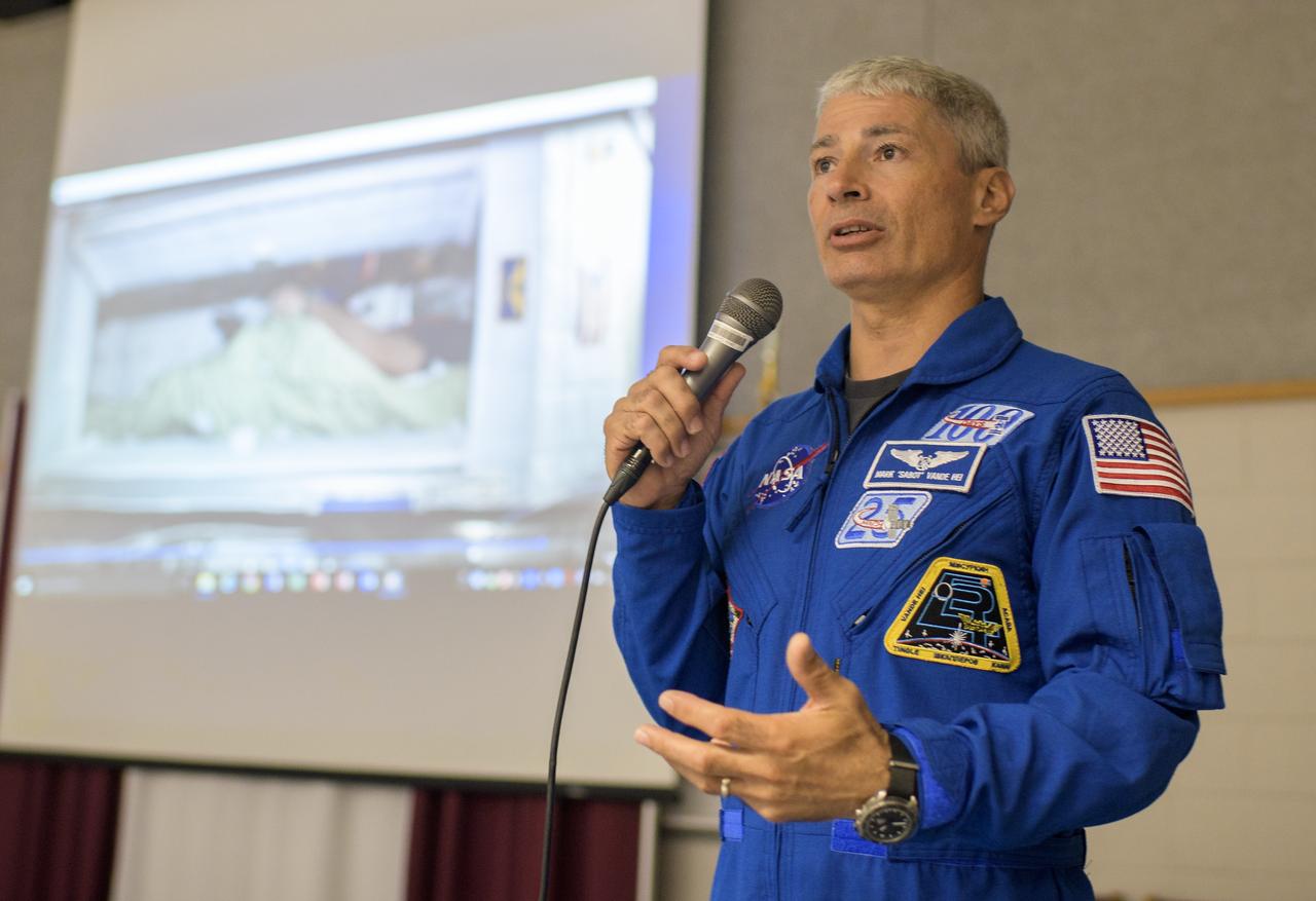 NASA astronaut Mark Vande Hei speaks about his time onboard the International Space Station during a presentation to students at Walt Whitman Middle School, Thursday, June 14, 2018 in Alexandria, Va. Vande Hei and astronaut Joe Acaba answered questions from the audience and spoke about their experiences aboard the International Space Station for 168 days as part of Expedition 53 and 54. Photo Credit: (NASA/Joel Kowsky)