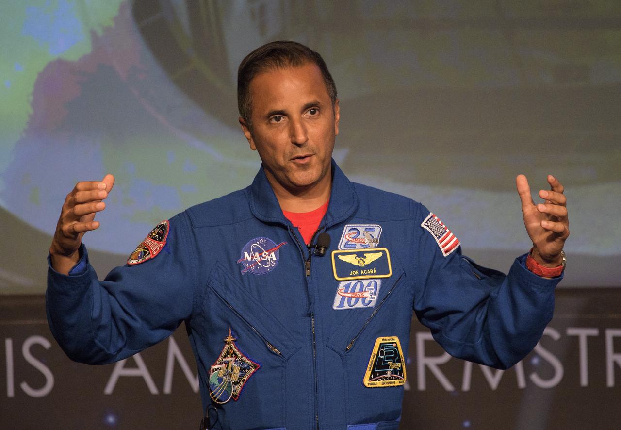 NASA astronaut Joe Acaba speaks about his time onboard the International Space Station, Friday, June 15, 2018 at NASA Headquarters in Washington. Acaba and astronaut Mark Vande Hei answered questions from the audience and spoke about their experiences aboard the International Space Station for 168 days as part of Expedition 53 and 54. Photo Credit: (NASA/Joel Kowsky)