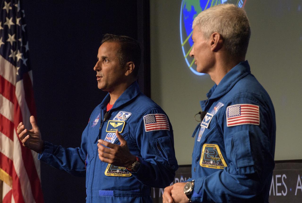 NASA astronauts Joe Acaba, left, and Mark Vande Hei, right, answer questions from the audience after speaking about their time onboard the International Space Station, Friday, June 15, 2018 at NASA Headquarters in Washington. Acaba and Vande Hei answered questions from the audience and spoke about their experiences aboard the International Space Station for 168 days as part of Expedition 53 and 54. Photo Credit: (NASA/Joel Kowsky)
